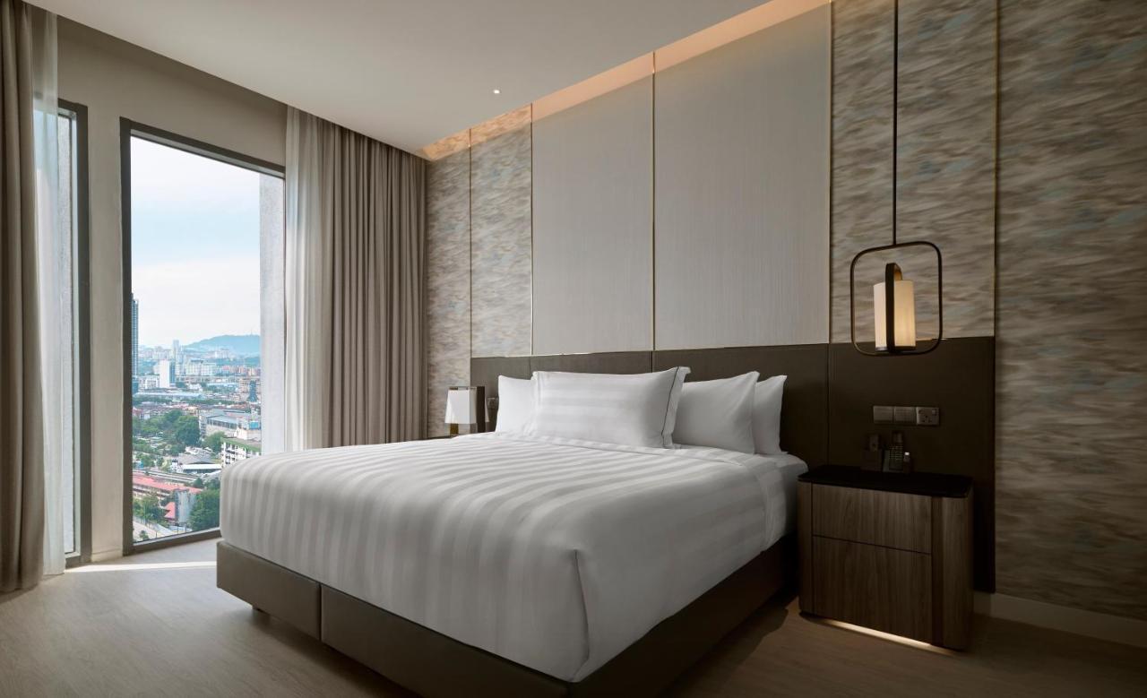 Pan Pacific Serviced Suites 吉隆坡 外观 照片 A bedroom at the hotel